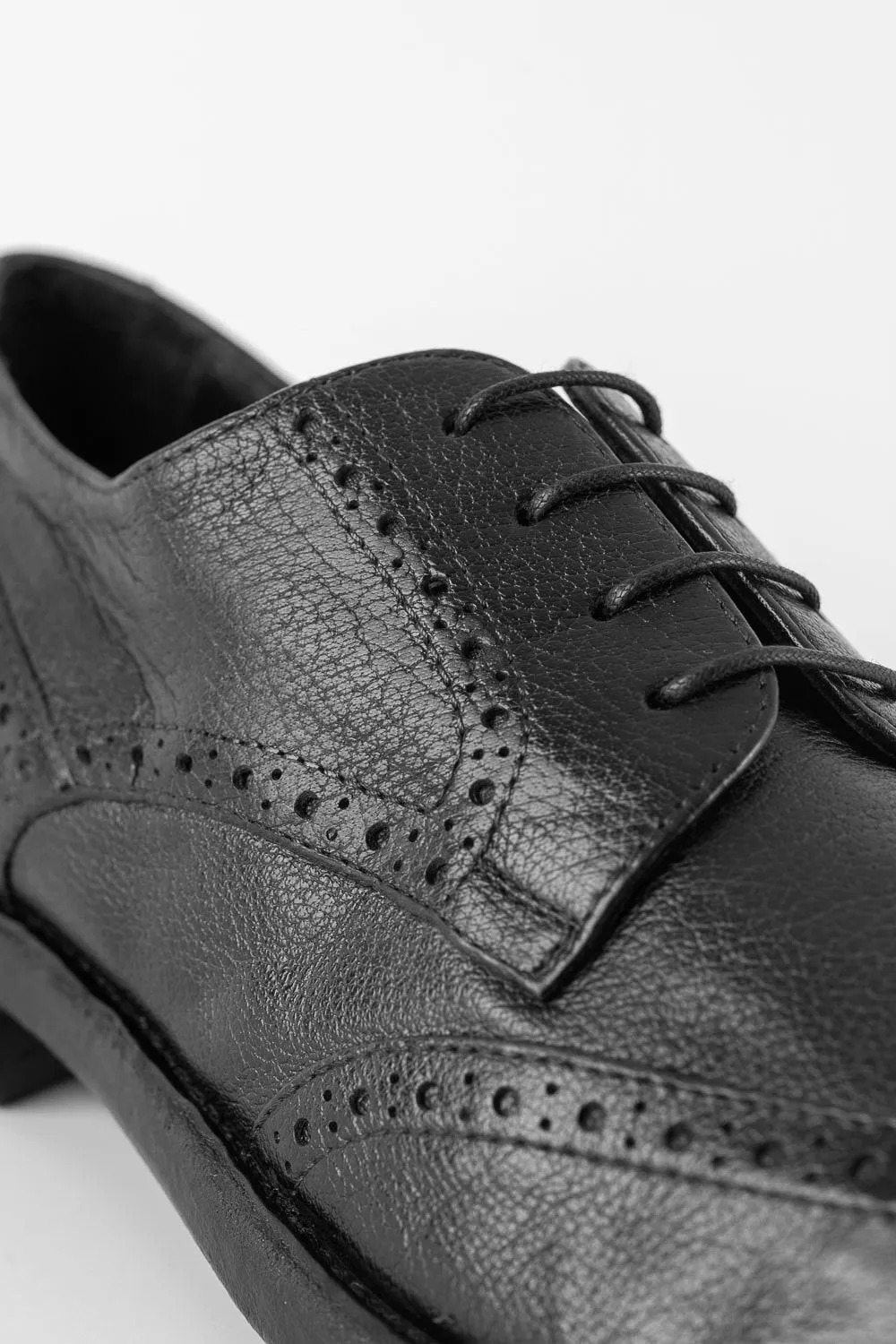 SLOANE black-ash brogue derby shoes.